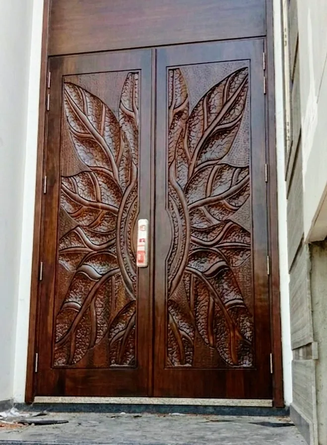 Carved wooden double door project